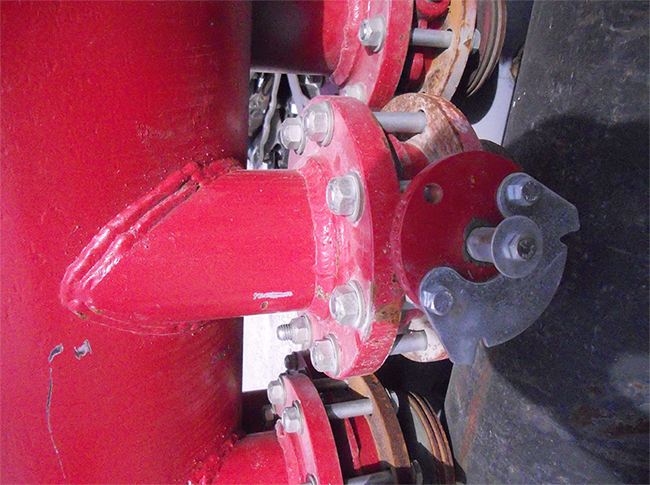 Left: A fabricated flange adapter welded to missile manifold that will fail prematurely due to poor alignment of birds beak to pipe (double weld seam).