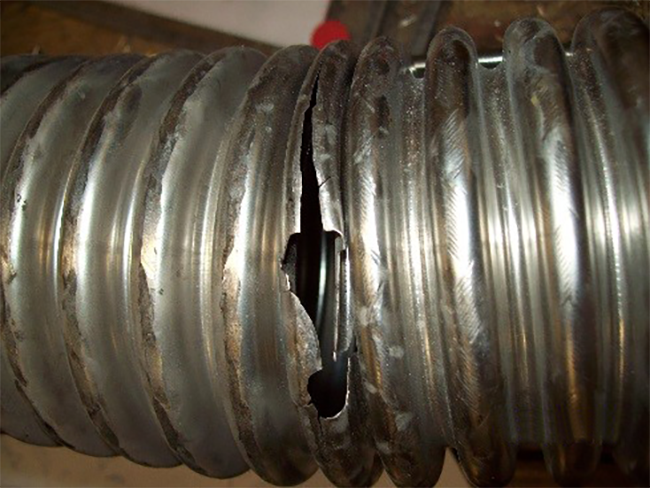 Ruptured Metal Hose